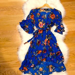 Blue ruffles bottom and arm dress.